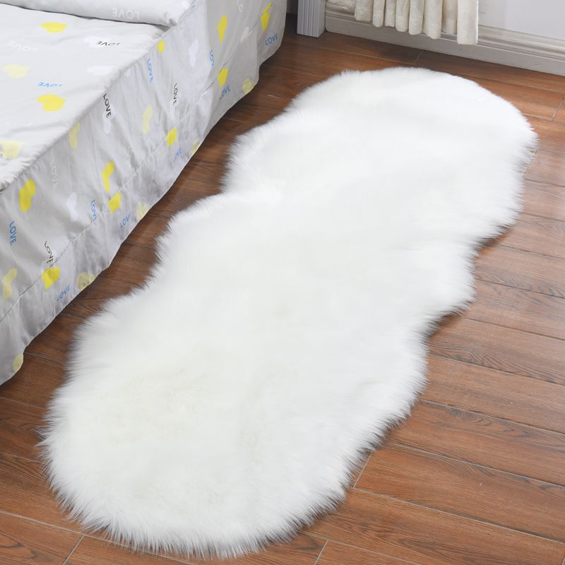 Alfombra de piel sintética de  - Cowhide Rug Faux reseña y precio